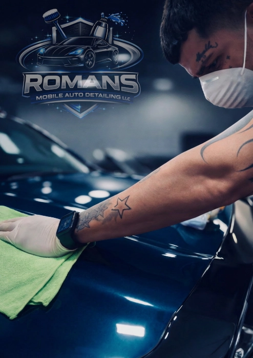 Romans Mobile Auto Detailing Owner Daniel Roman in CT mobile auto detailing a vehicle